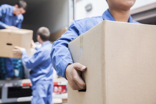 Removals team planning a flat move in Merton