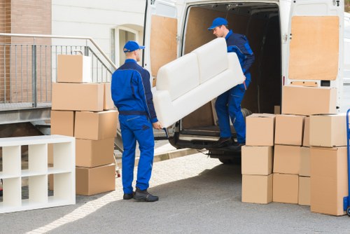 Careful furniture delivery and placement at a new Merton property