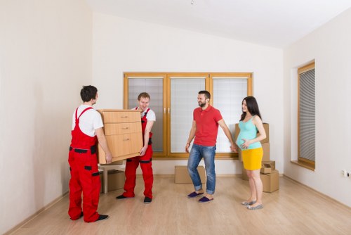 Packing and organising belongings before using storage in Merton