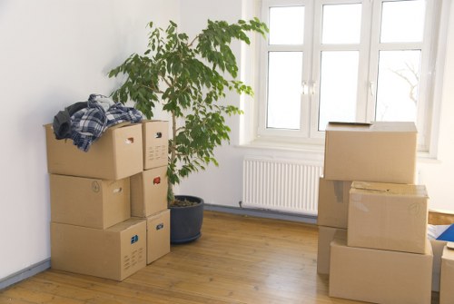 Local packing team preparing household items for transport in Merton