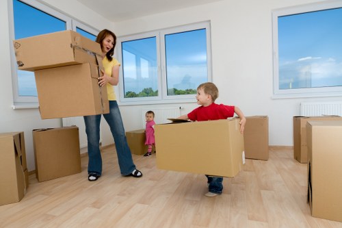 Packed boxes and furniture ready for transport in Merton