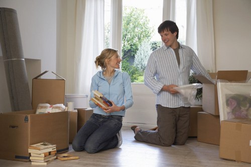 Careful loading of household items for a local move in Merton