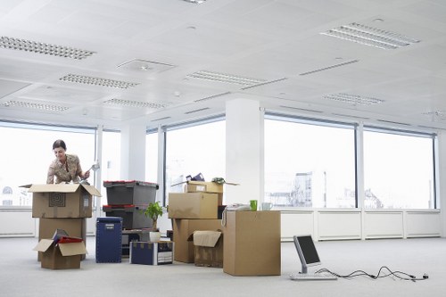 Packed boxes and furniture ready for removal truck hire in Merton